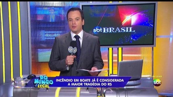 Marcelo Torres apresentando os boletins jornalísticos do SBT, no "Domingo Legal"