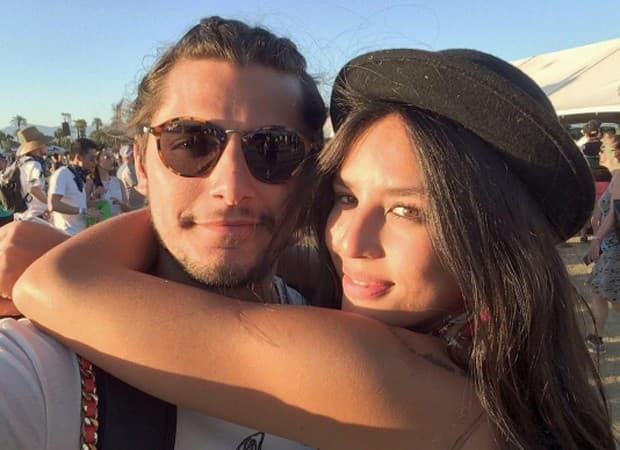 Bruno Gissoni e Yanna Lavigne aparecem de chamego na cama ao lado da filha