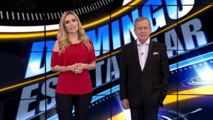 Thalita Oliveira e Paulo Henrique Amorim no "Domingo Espetacular" (Foto: Reprodução/Record)