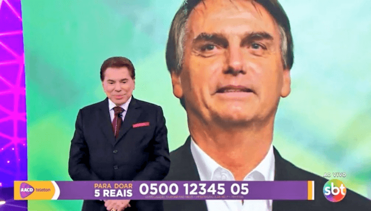 OPINIÃO | No Teleton 2018, Silvio Santos novamente erra feio ao bajular Bolsonaro e constranger Claudia Leitte