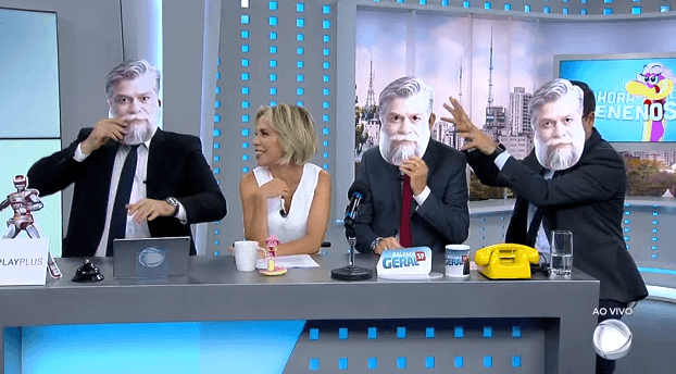 Apresentadores da Record surpreendem e aparecem usando máscaras com o rosto de Fábio Assunção ao vivo