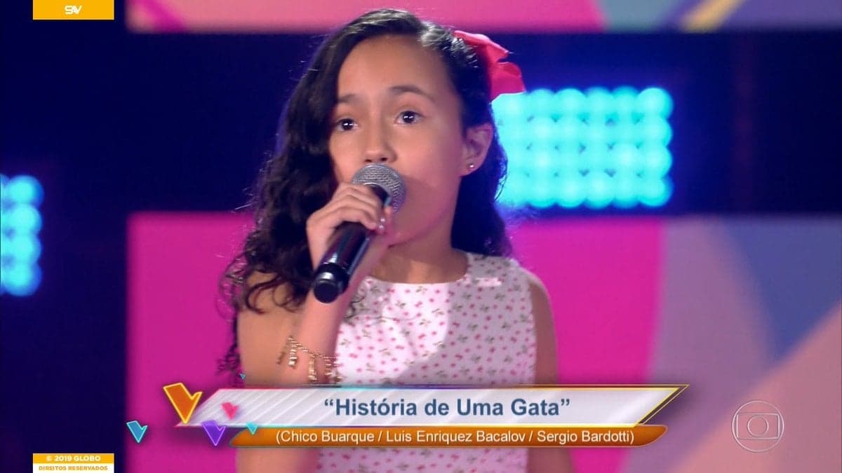 Cacau foi uma das participantes do The Voice Kids deste domingo (Foto: Reprodução) Cacau foi uma das participantes do The Voice Kids deste domingo (Foto: Reprodução)