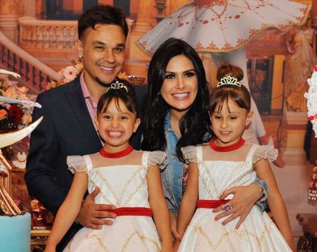 Vestidas de noivas, filhas do cantor Leandro, do grupo KLB, roubam a cena em festa junina