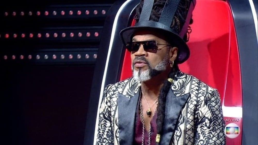 Globo faz campanha, tenta esconder, mas deixa vazar nome de cantora que deve substituir Carlinhos Brown no The Voice Brasil