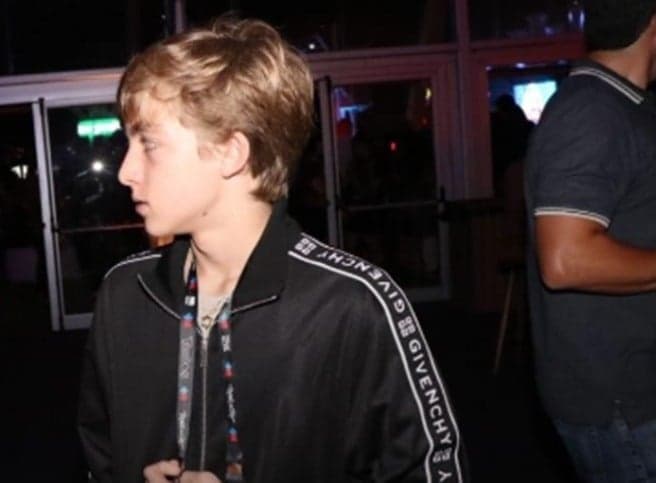 Filho de Luciano Huck vai ao Rock in Rio com a namorada, tenta esconder a mesma, mas identidade da jovem é revelada
