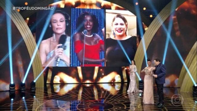 Marília Mendonça não aparece para receber troféu e Faustão anuncia que ela está dando à luz