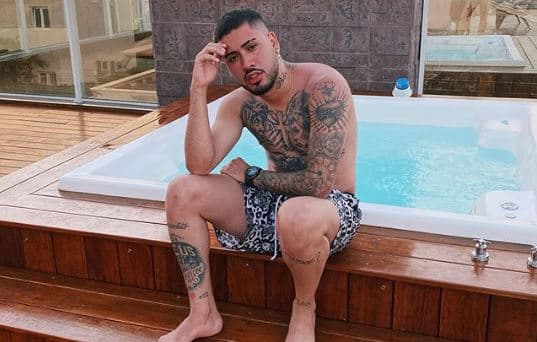 Ex de Flávia Pavanelli, o famoso cantor e funkeiro, Kevinho deixou os seus seguidores de queixo caído ao falar sobre tatuagem com namorada (Foto: Reprodução/Instagram) Ex de Flávia Pavanelli, o famoso cantor e funkeiro, Kevinho deixou os seus seguidores de queixo caído ao falar sobre tatuagem com namorada (Foto: Reprodução/Instagram)