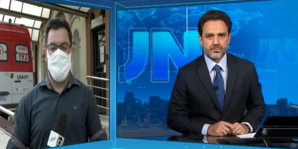 Paulo Renato Soares e o repórter Gustavo Oliva em cobertura do "Jornal Nacional" (Foto: Reprodução/TV Globo)