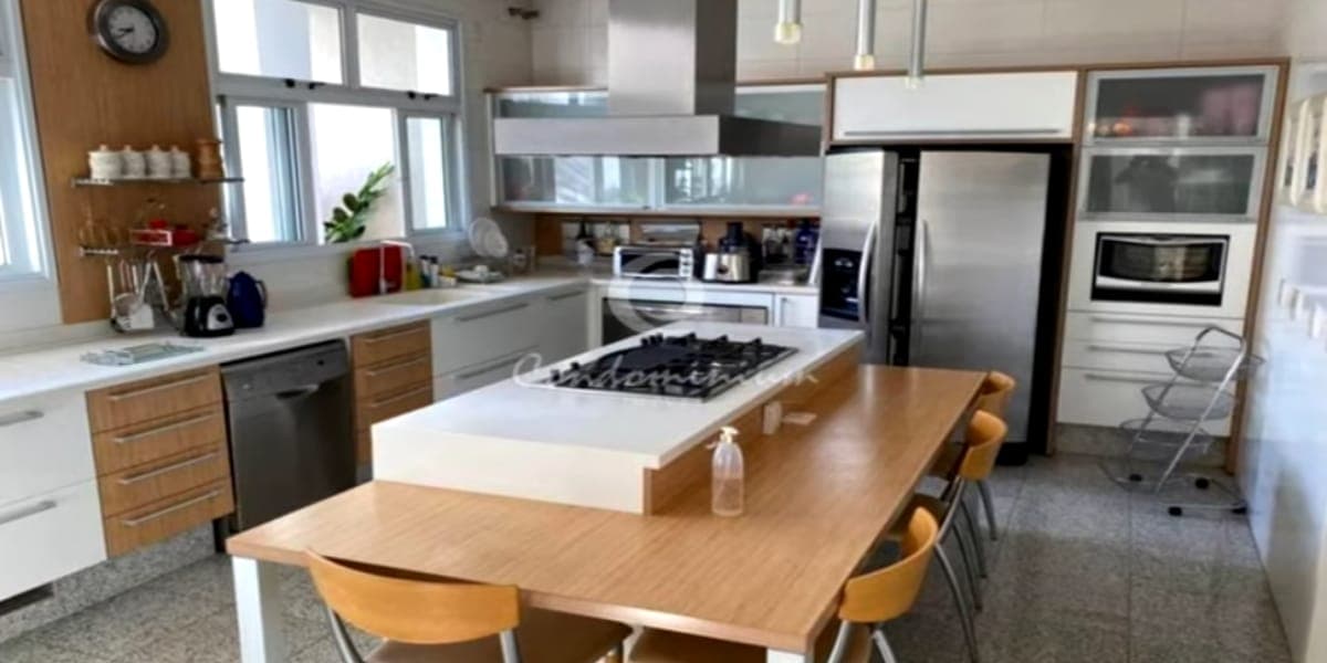 Sala de jantar e cozinha moderna da mansão (Reprodução: Youtube)