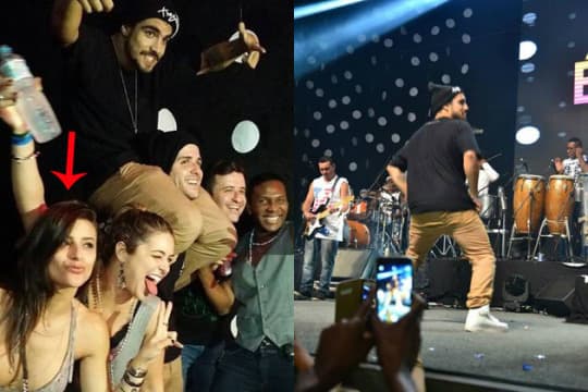 Sem Maria Casadevall, Caio Castro dança em show do É o Tchan e beija morena
