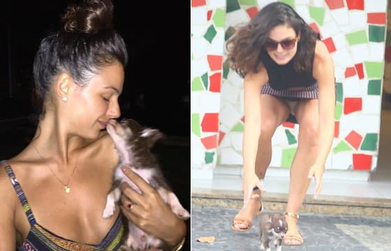 Isis Valverde se abaixa para pegar cachorro e é traída por saia; veja foto