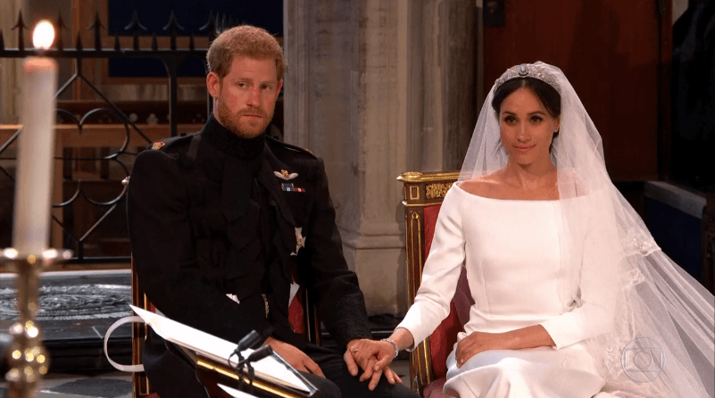 Príncipe Harry e a atriz Meghan Markle durante o casamento (Foto: Reprodução/Globo) Príncipe Harry e a atriz Meghan Markle durante o casamento (Foto: Reprodução/Globo)