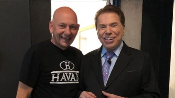 Silvio Santos surpreendeu e anunciou a contratação de Luciano Hang, rival de Rachel Sheherazade (Foto: Reprodução) Silvio Santos surpreendeu e anunciou a contratação de Luciano Hang, rival de Rachel Sheherazade (Foto: Reprodução)