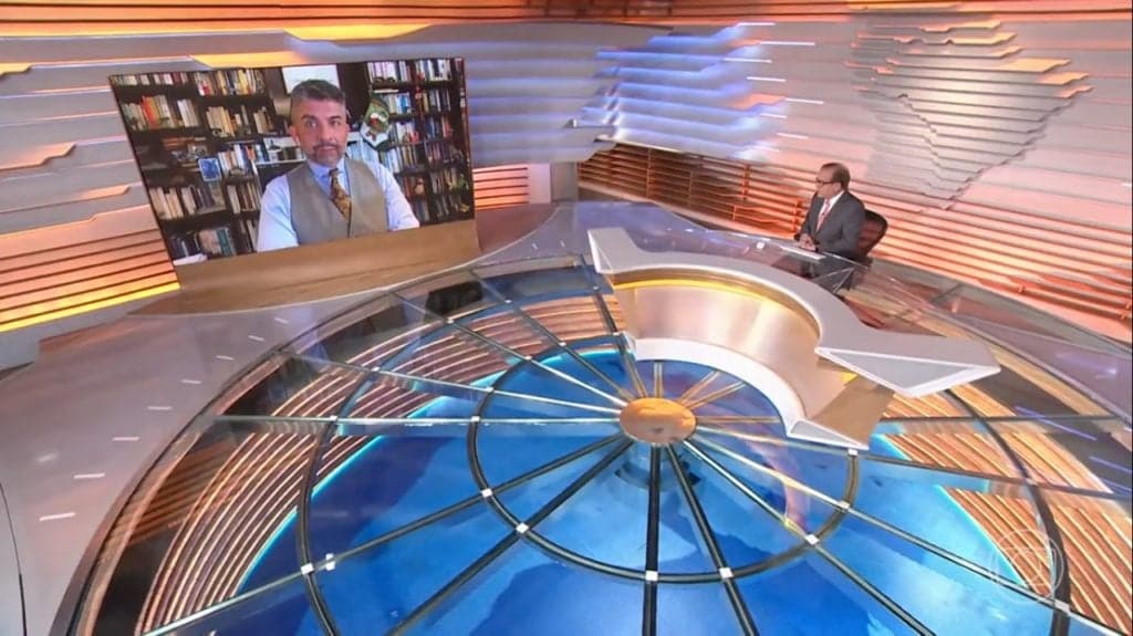 Chico Pinheiro em conversa com Ariel Palácios no Bom Dia Brasil (Foto: Reprodução/Globo) Chico Pinheiro em conversa com Ariel Palácios no Bom Dia Brasil (Foto: Reprodução/Globo)