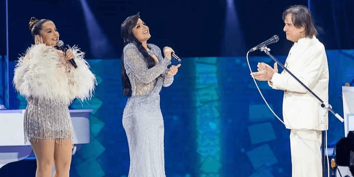 Maiara e Maraisa cantando com Roberto Carlos (Foto: Divulgação) Maiara e Maraisa cantando com Roberto Carlos (Foto: Divulgação)
