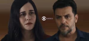 Travessia - Após fazer papel de palhaça, Guida atazana Moretti e jura vingança: "Fazer inferno na vida dele" (Foto: Reprodução / Globo / Montagem TV Foco) Travessia - Após fazer papel de palhaça, Guida atazana Moretti e jura vingança: "Fazer inferno na vida dele" (Foto: Reprodução / Globo / Montagem TV Foco)