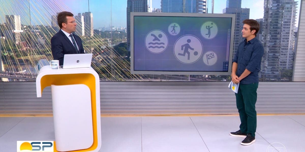 Alê Jodar estava torcendo para que Rodrigo Bocardi não percebesse a imagem do jornalista no telão (Reprodução: Bom Dia SP/ Globo) Alê Jodar estava torcendo para que Rodrigo Bocardi não percebesse a imagem do jornalista no telão (Reprodução: Bom Dia SP/ Globo)