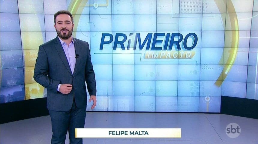 Mudanças no programa de notícias do SBT, o Primeiro Impacto, com novo pacote gráfico e cenário, e Felipe Malta - Foto Reprodução SBT Mudanças no programa de notícias do SBT, o Primeiro Impacto, com novo pacote gráfico e cenário, e Felipe Malta - Foto Reprodução SBT