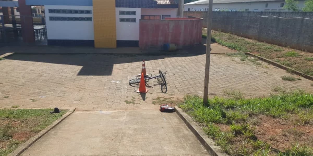 Criança e padrasto estavam entrando em escola quando foram baleados (Foto: Henrique Zuba/ Inter TV ) Criança e padrasto estavam entrando em escola quando foram baleados (Foto: Henrique Zuba/ Inter TV )